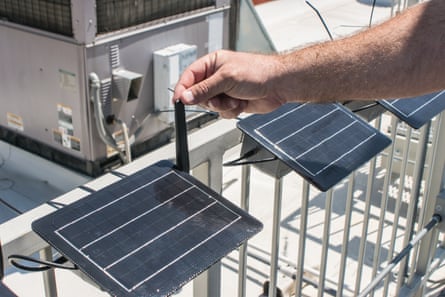 a person calibrating rooftop air monitoring