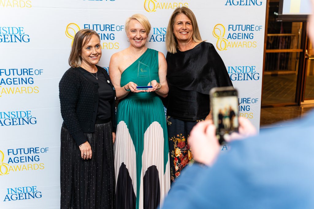 Proveda's CEO Kaz Dawson (centre) accepting the award at the 2025 Future of Ageing Awards, Sydney.