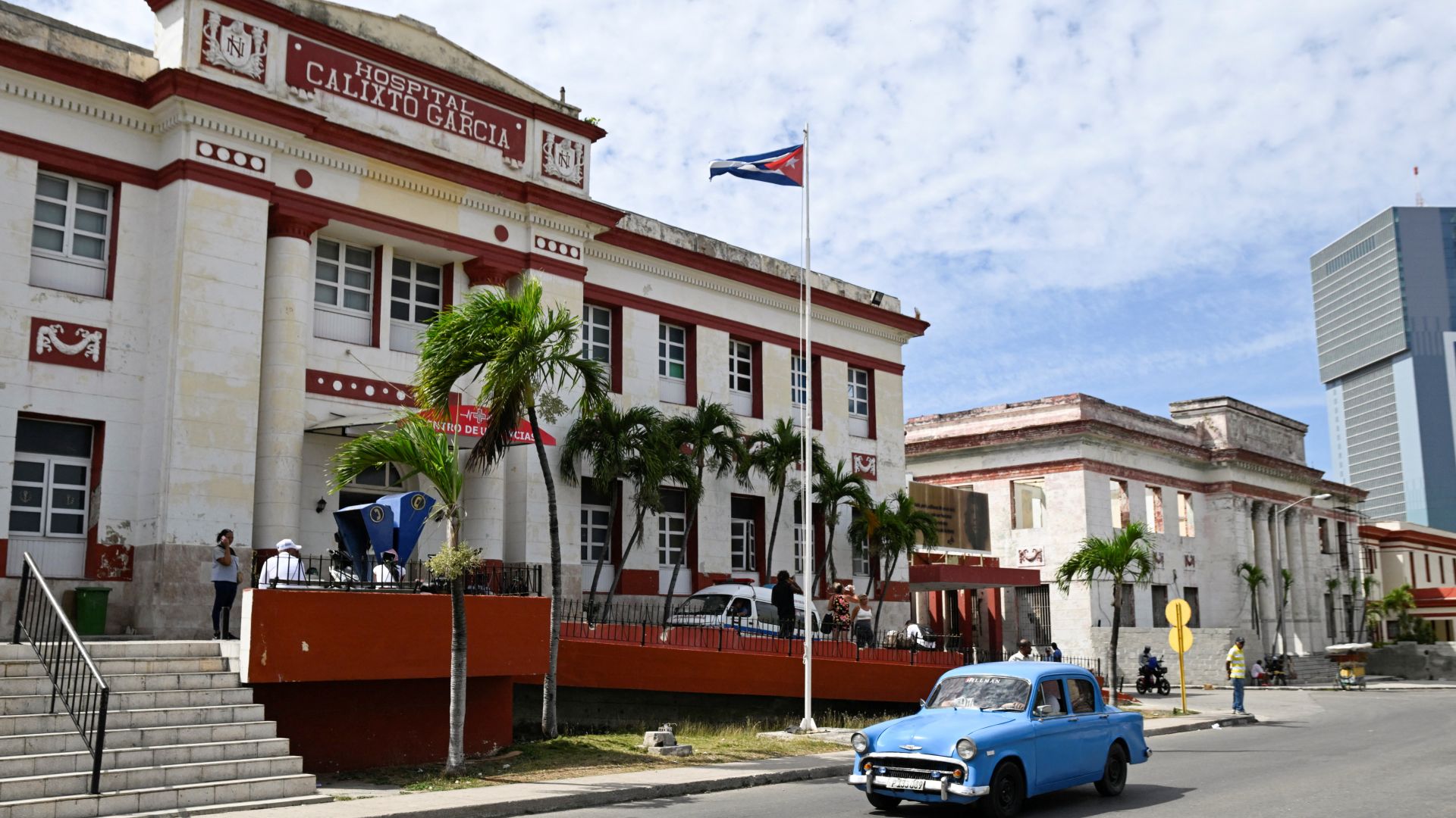 A vintage car passes by the Calixto Garcia hospital as Cuba’s once-vaunted healthcare system, long hailed as a cornerstone of the 1959 revolution, has deteriorated amid years of economic crisis and U.S. sanctions, a decline that has accelerated this year with U.S. restrictions on oil supplies, in Havana, Cuba, March 24, 2026. REUTERS/Norlys Perez