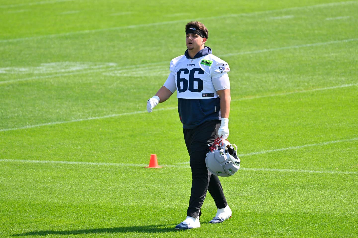 Jul 25, 2026; Foxborough, MA, USA; New England Patriots offensive tackle Will Campbell (66) walks to the practice fields at training camp at Gillette Stadium.
