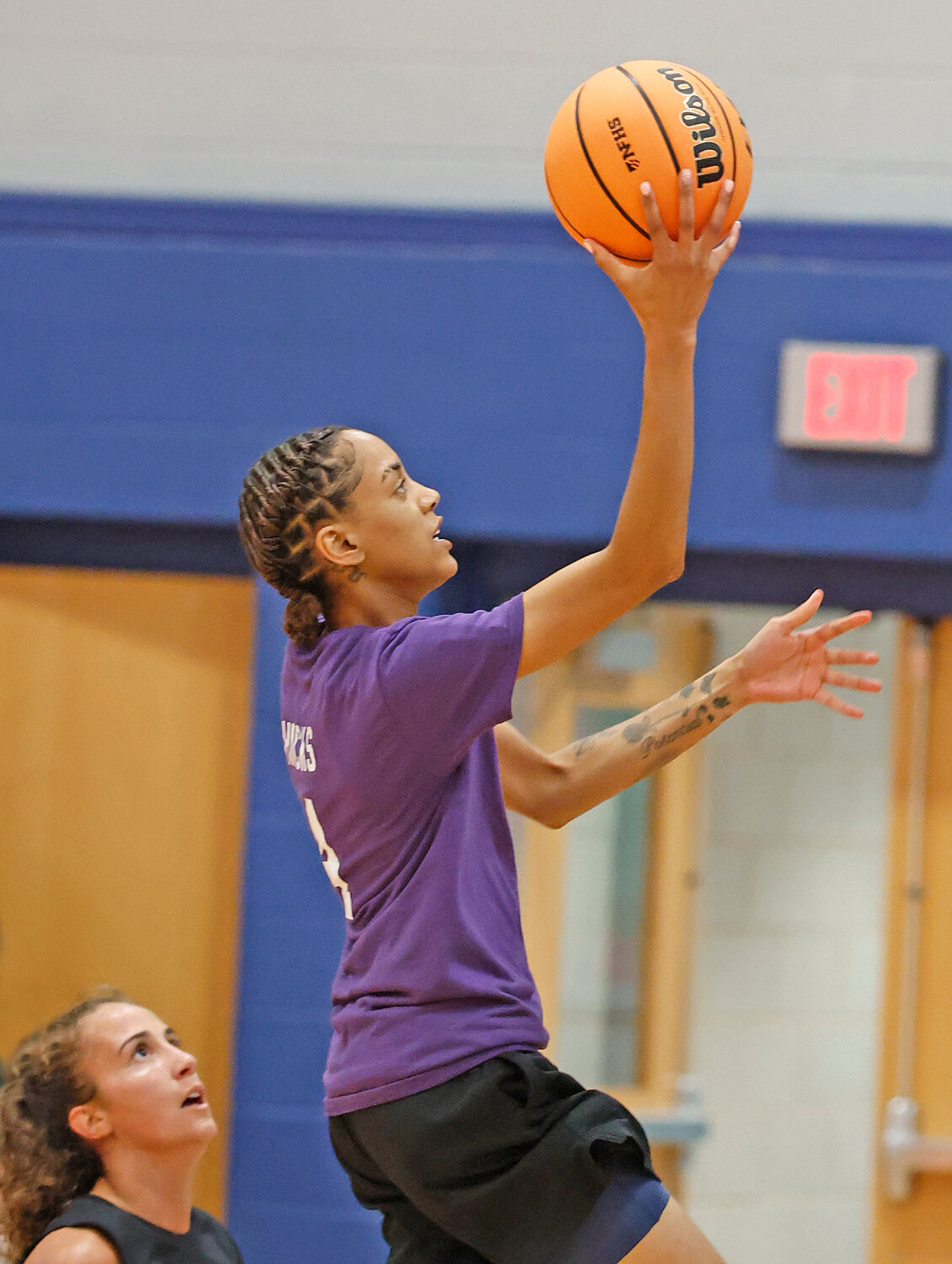 Taking a shot for summer team Purple Haze is Bry Hicks, who’ll be a senior at Chestnut Hill College.