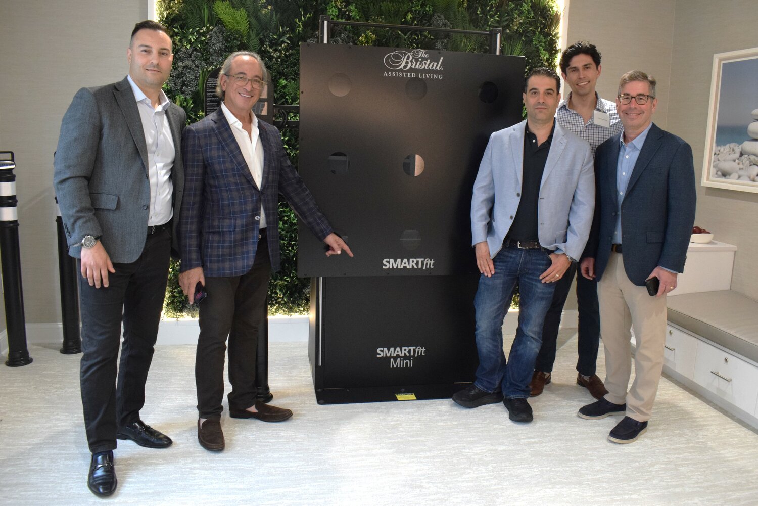 B2K Executives Nick Cappadara, left, Jan Berman, David Berman, Craig Hasheb and Joshua Edwards at the BrainFit Gym opening.