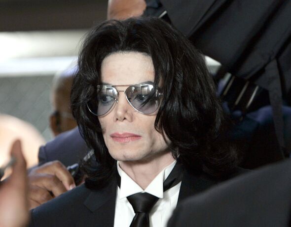SANTA MARIA, CA - JUNE 13: Michael Jackson prepares to enter the Santa Barbara County Superior Court to hear the verdict read i