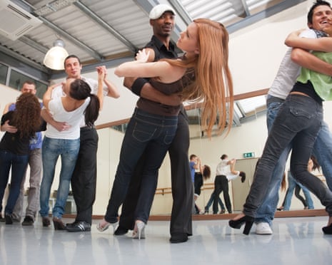 Couples at a salsa dance class