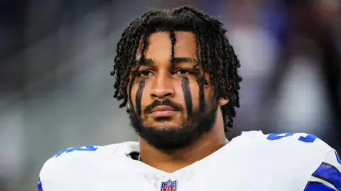 Getty Images Marshawn Kneeland during a Cowboys game