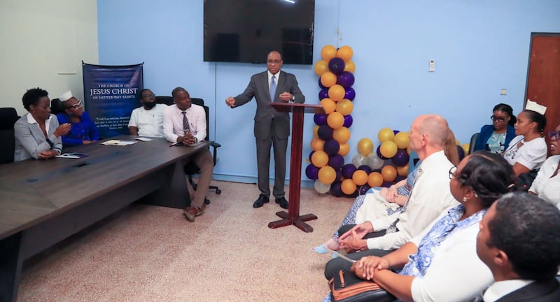 Elder Ahmad S. Corbitt, a General Authority Seventy and member of the Church's Caribbean Area presidency, speaks at an event where the Church donated medical equipment to two hospitals in Jamaica.