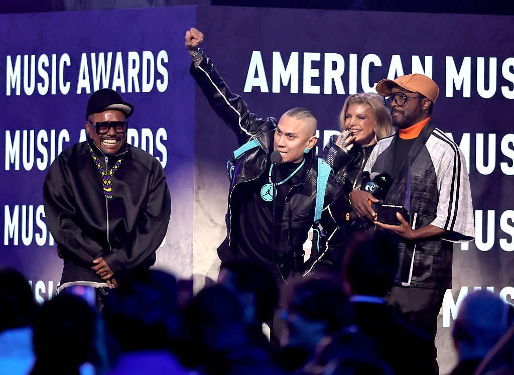 apl.de.ap, Taboo, Fergie and will.i.am of Black Eyed Peas accept the Best Throwback Song award for 'Rock That Body' onstage