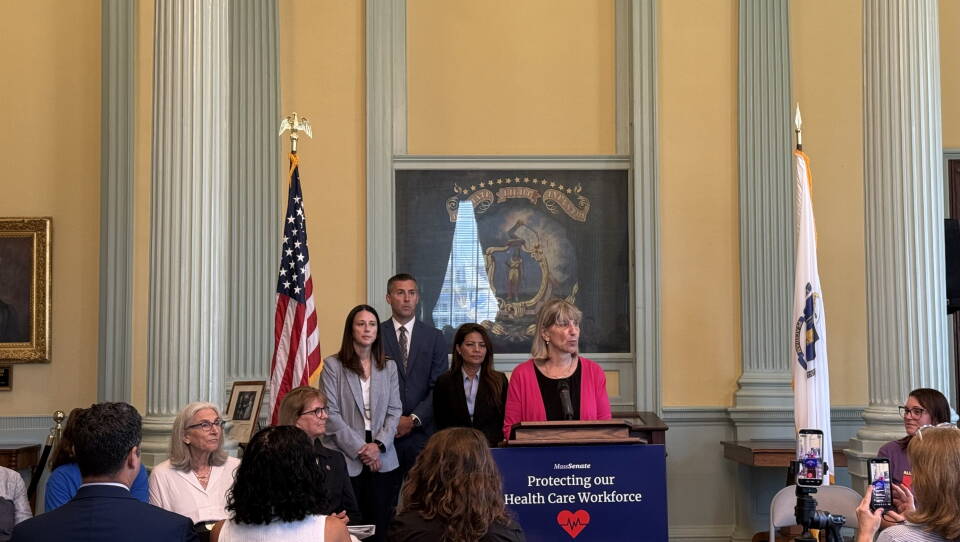 Karen Spilka speaks at a podium.