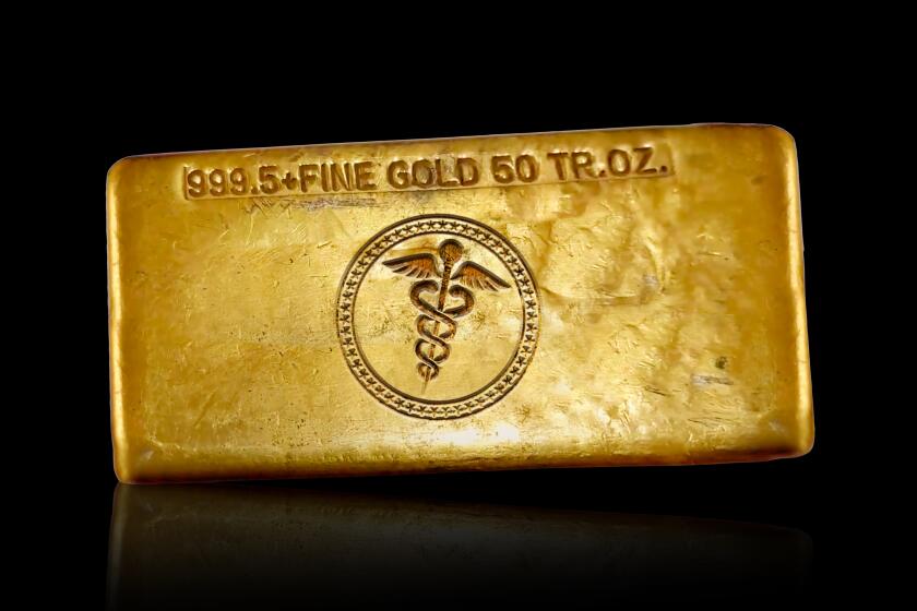 gold bullion with a caduceus embossed into it