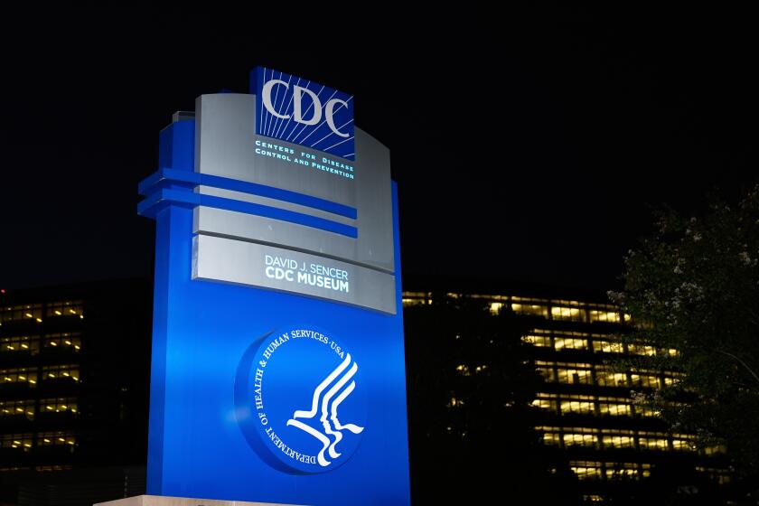 A sign marks the entrance to the U.S. Centers for Disease Control in Atlanta.