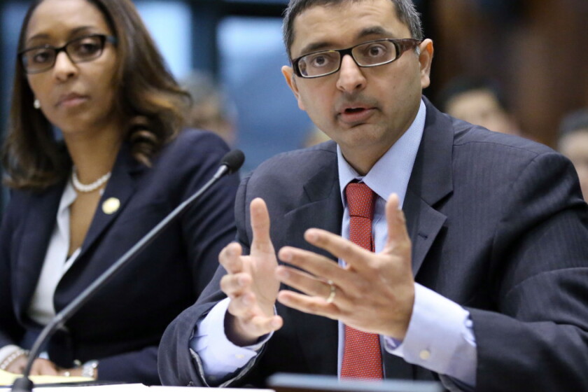 Former state health department Dr. Nirav Shah (right), who was Illinois' state health chief under former Gov. Bruce Rauner, is running as a Democrat for the U.S. Senate in Maine.