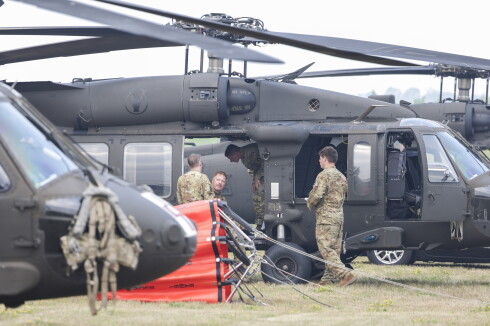 military helicopters ready for firefighting mission