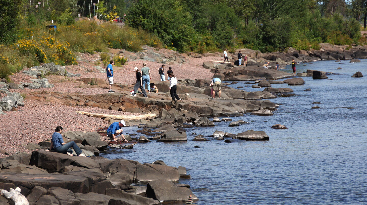 People enjoy weather at beach