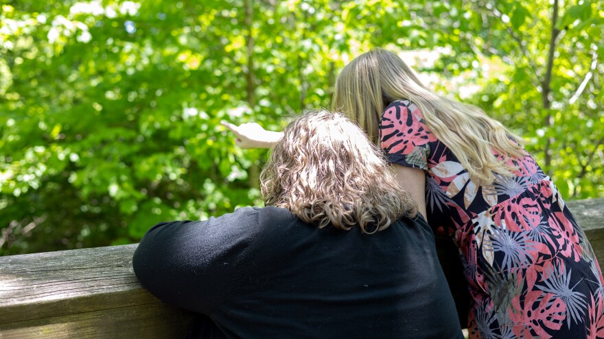 Jennilyn Nichols and her daughter Flower explore an Indianapolis park on Thursday, May 14, 2026. The family has lost