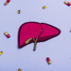 Human liver organ and pills. World hepatitis day. National liver health awareness month. Liver transplantation, donation background. Save patient life in hospital with liver transplant