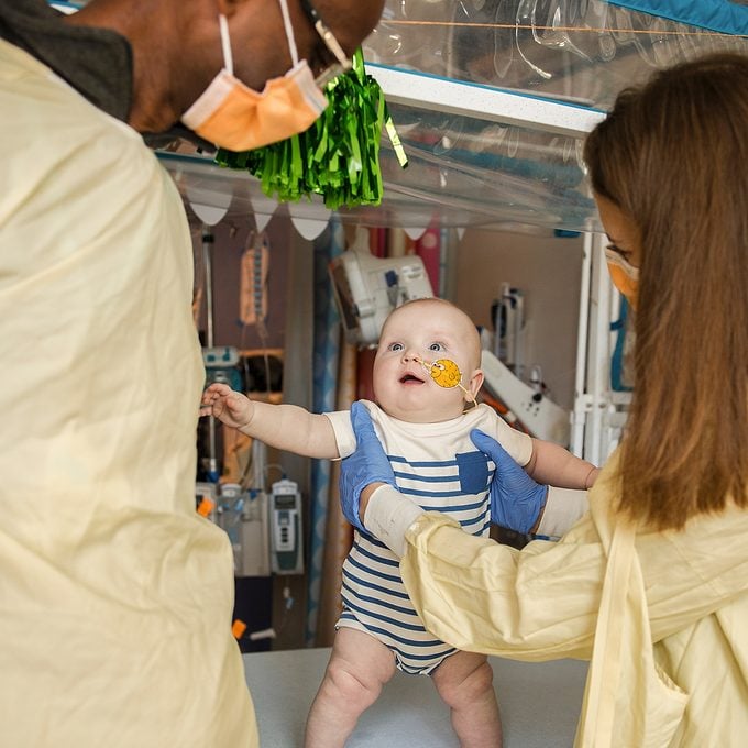 baby with doctors in a hospital
