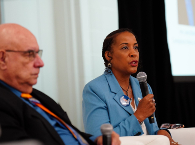 Athens County, Ohio Commissioner Lenny Eliason and Loudoun County, Va. Chair Phyllis J. Randall discuss the Good Governance Is Good Health toolkit Saturday. Photo by Leon Lawrence III