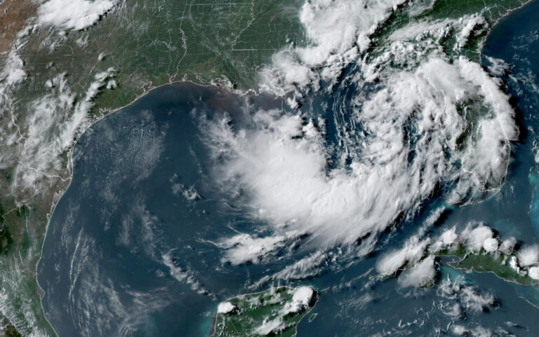 Tropical depression nearing US Gulf Coast set to become a tropical storm, forecasters say Tropical depression nearing US Gulf Coast set to become a tropical storm, forecasters say