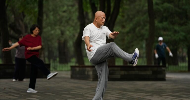 Tai chi practitioners seek balance and well-being in fast Tai chi practitioners seek balance and well-being in fast