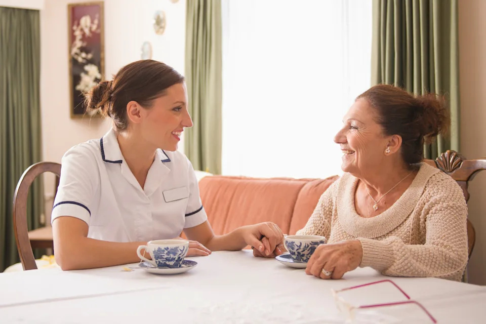 Person with elderly aged care resident