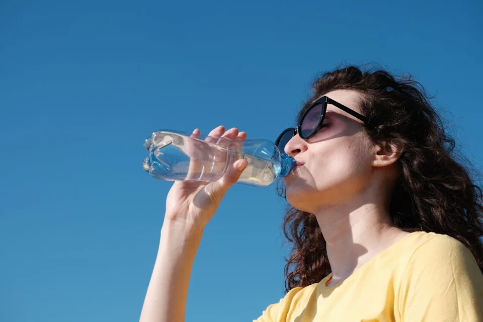 Try and make water your default drink (Alamy/PA)