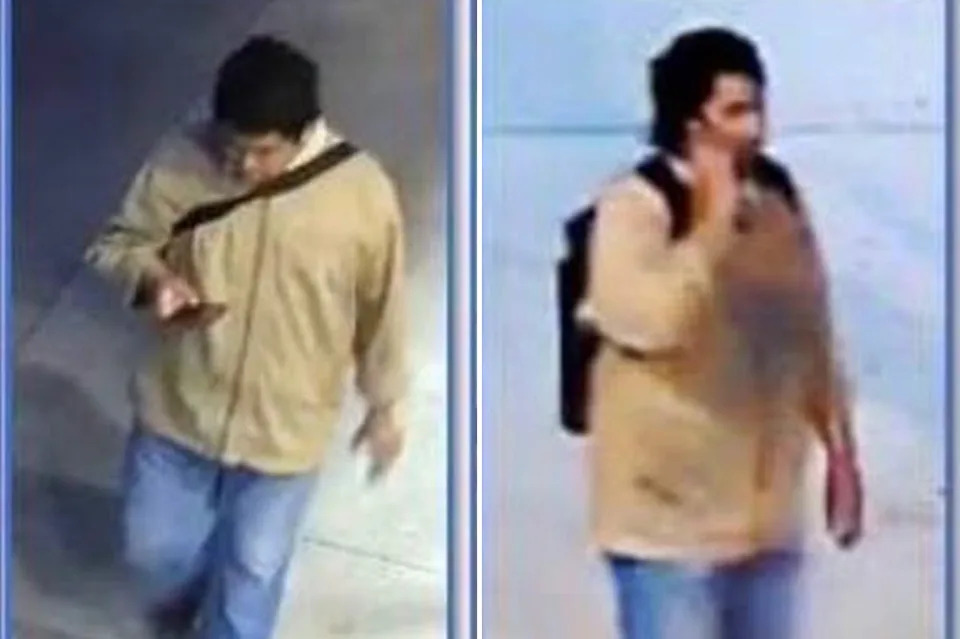 The suspect is described as standing 6 feet tall, with brown eyes and black hair, a large build and a thick neck, police said.