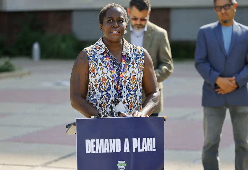 East Lansing mother and cancer survivor Dana Watson speaking Tuesday at Lansing City Hall after signatures were turned in for a ballot proposal to establish a Citizens' Advisory Healthcare Action Committee. July 14, 2026 | Submitted photo