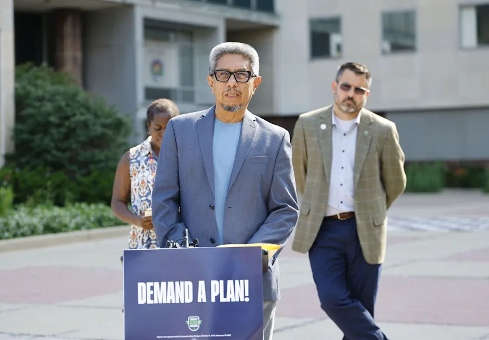 Oscar Castañeda, a Lansing resident as well as the regional organizing coordinator for MI Poder and a board member of the Ingham County Health Plan, speaking Tuesday at Lansing City Hall after signatures were turned in for a ballot proposal to establish a Citizens' Advisory Healthcare Action Committee. July 14, 2026 | Submitted photo