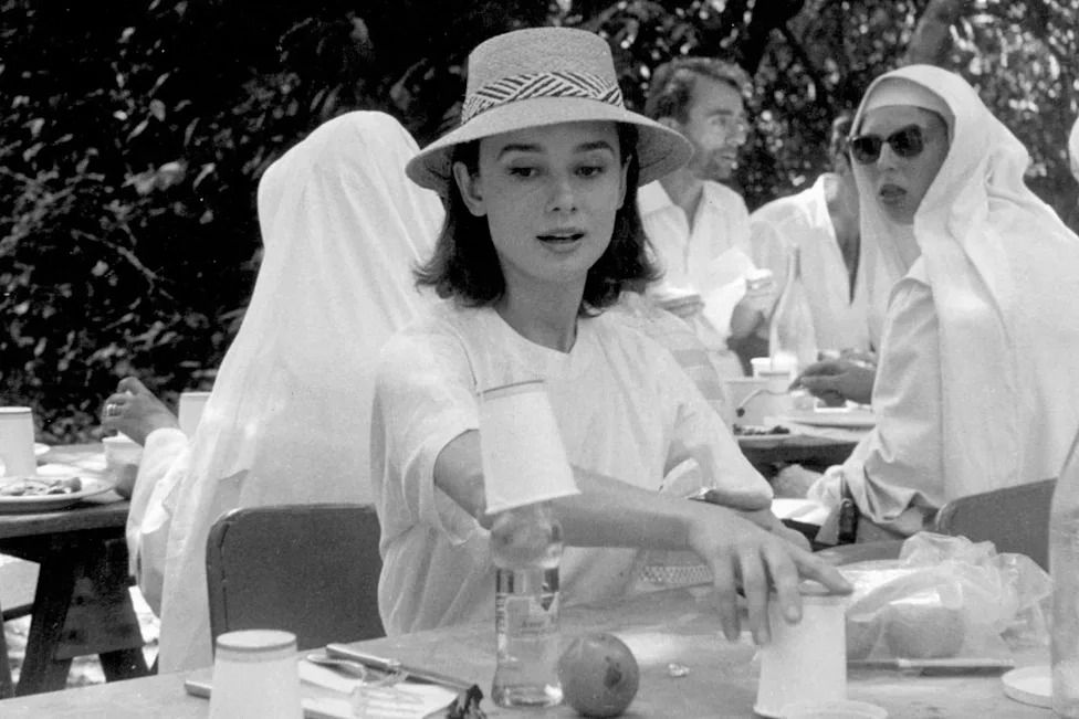 Audrey Hepburn having lunch on the set of 'The Nun's Story'Credit: Leo Fuchs/Getty