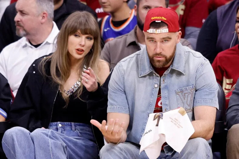 Taylor Swift and Travis Kelce attend The Knicks Game Against The Cavaliers in The Eastern Conference Finals Game 3