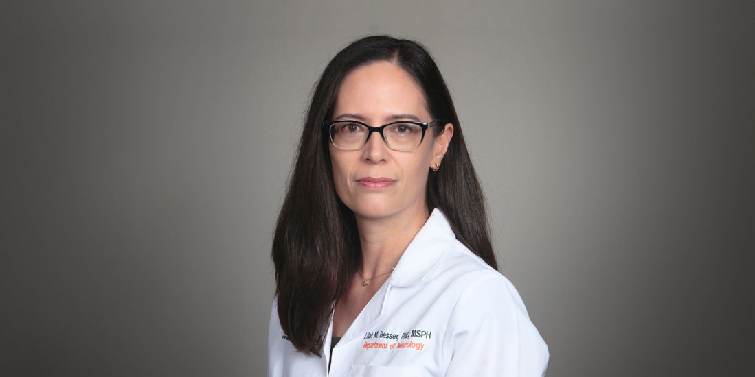 Dr. Lilah Besser in her white clinic coat