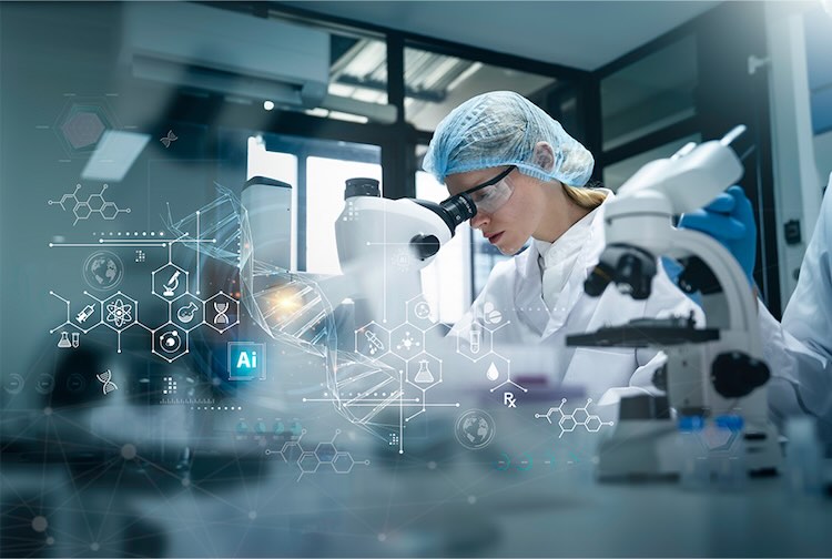Researcher in lab suit looking into a microscope