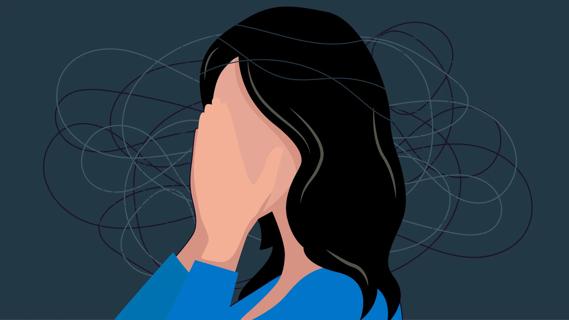 Person with hands over their face, with anxiety swirling around them