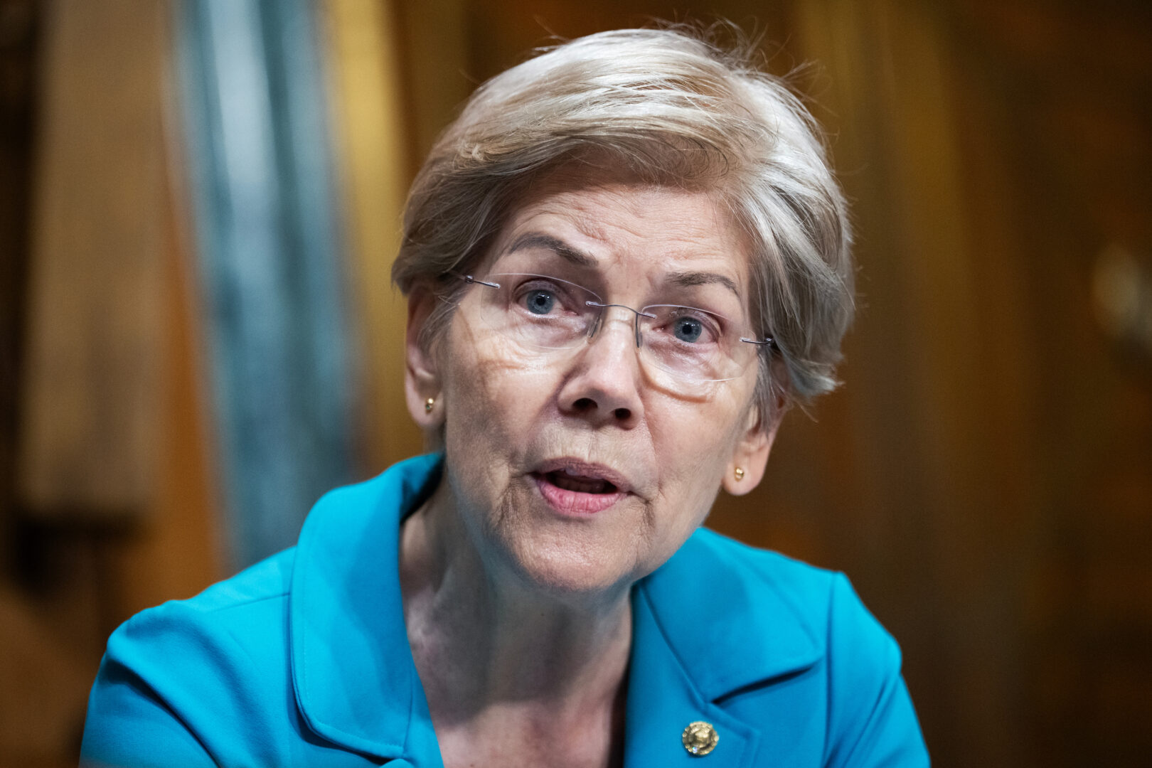 Sen. Elizabeth Warren, D-Mass., was the only Finance Committee member to oppose the modernization bill. She's shown at a hearing on July 22.