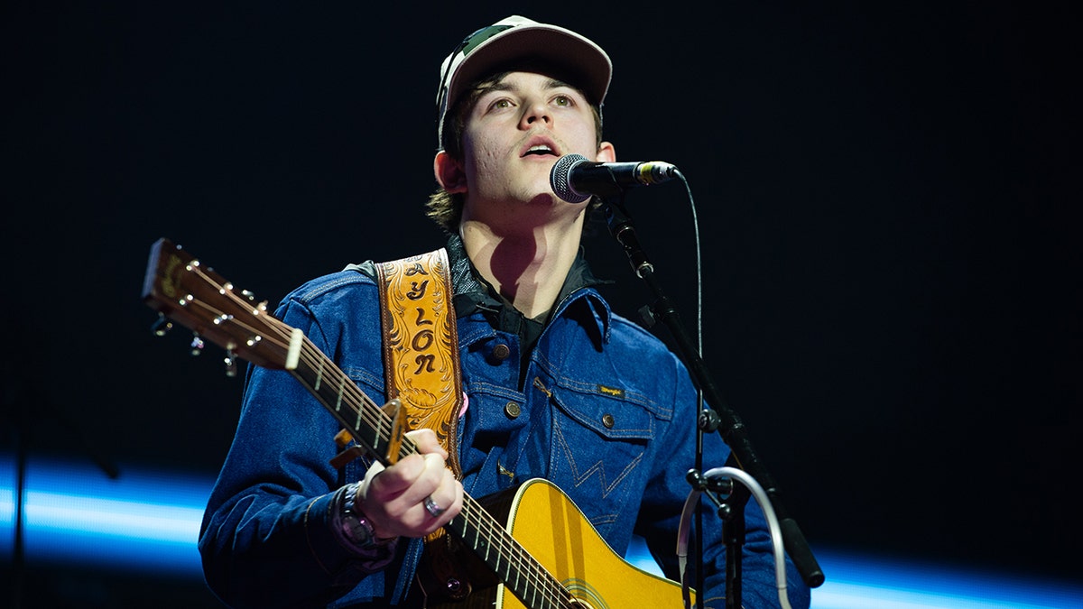 Waylon Wyatt performs onstage with a guitar during the C2C Country to Country festival at The O2 Arena.