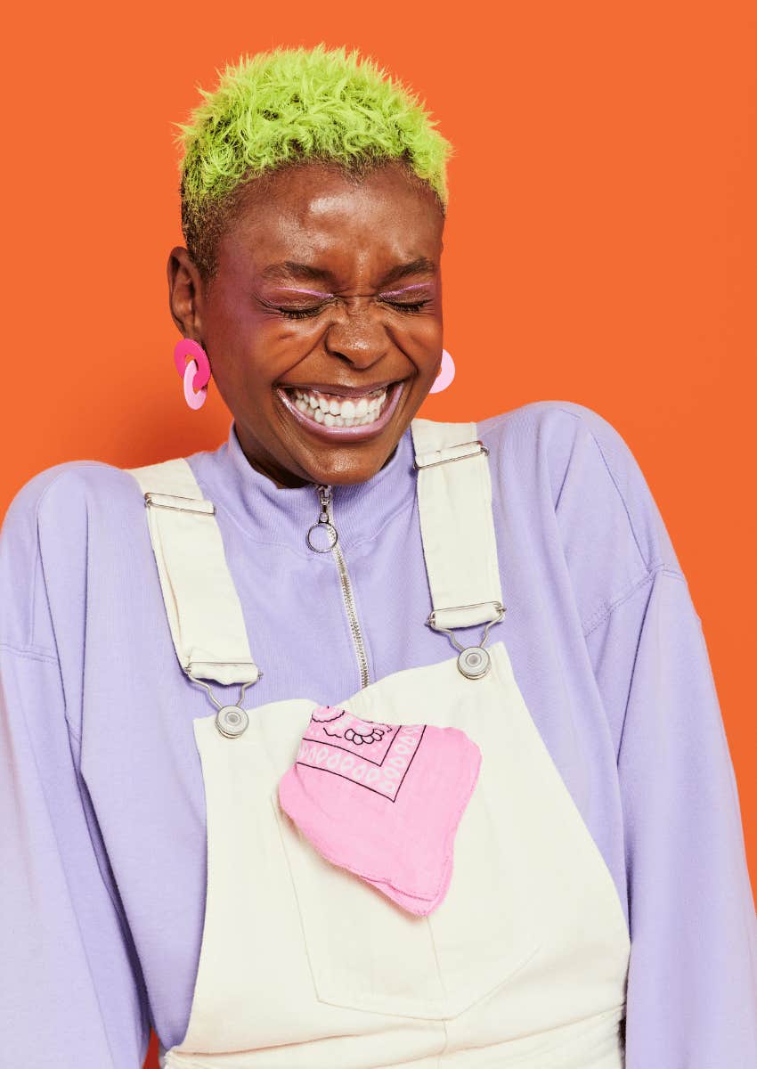 woman with bright clothes and hair being herself