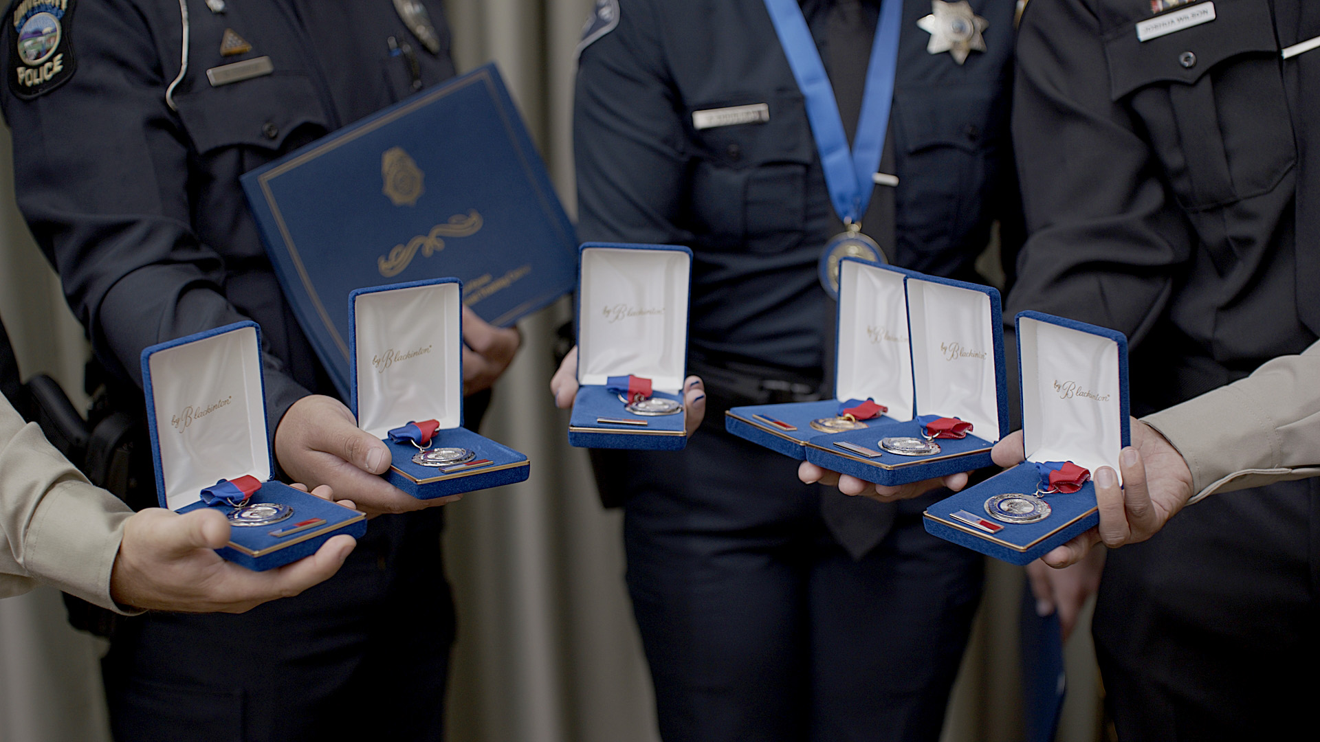 Officers display awarded medals