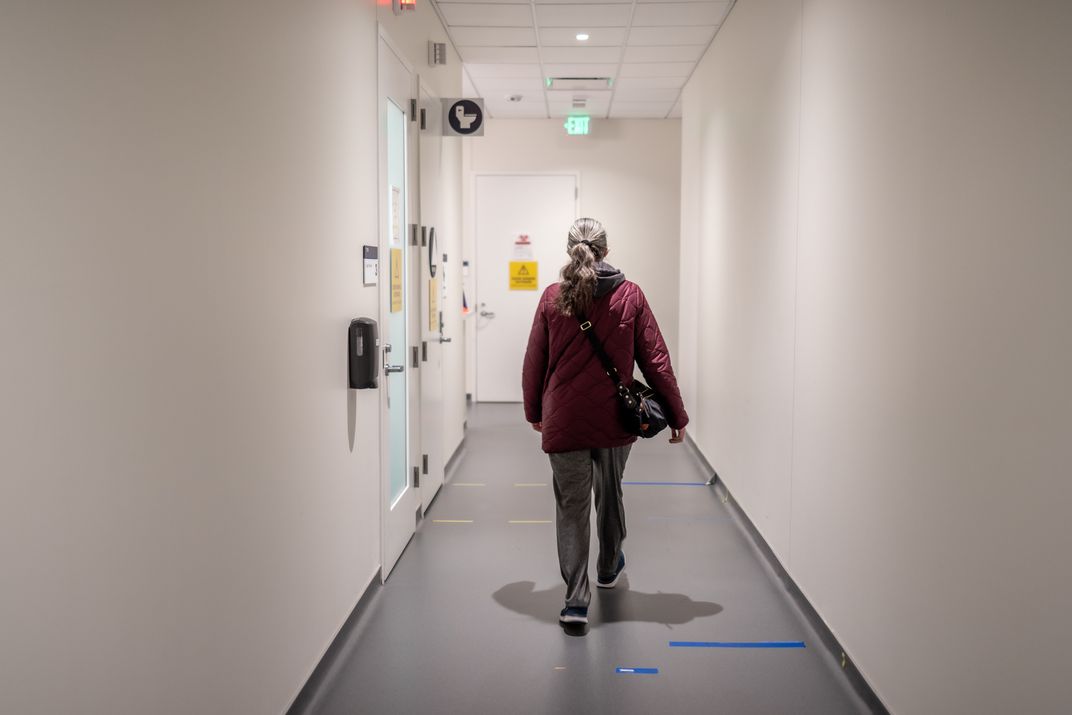 A LIINC participant departs after testing at the San Francisco hospital.