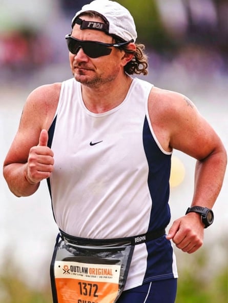 Chris Dunn pictured competing in an Ironman event in July 2026.