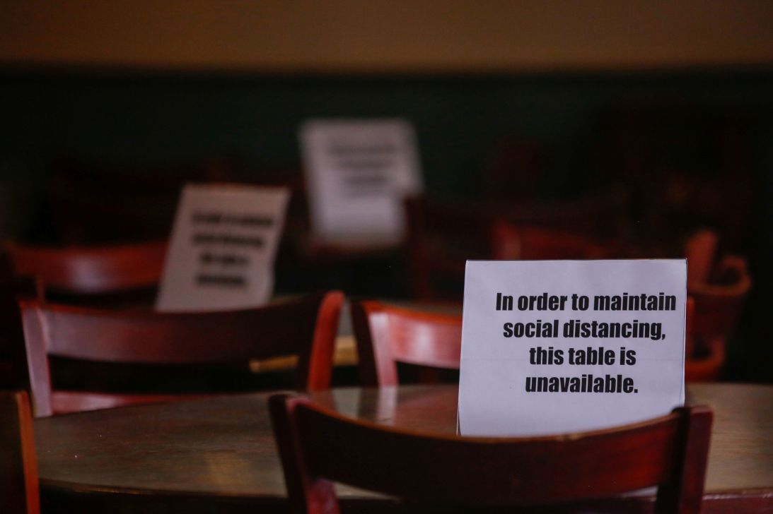 Restaurants and businesses implemented social distancing measures in 2020 to comply with state and local orders.