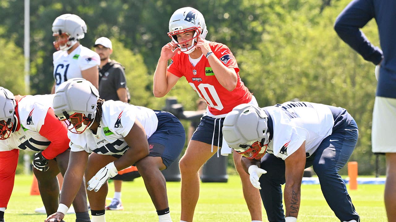 Jul 25, 2026; Foxborough, MA, USA; New England Patriots quarterback Drake Maye (10) reacts at training camp at Gillette Stadium. Mandatory Credit: Eric Canha-Imagn Images