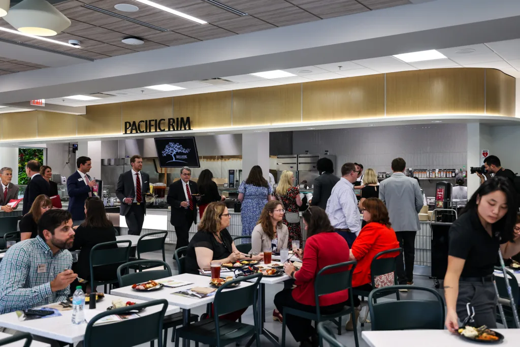 Guests dine and mingle inside the newly opened Hillside Dining Commons.