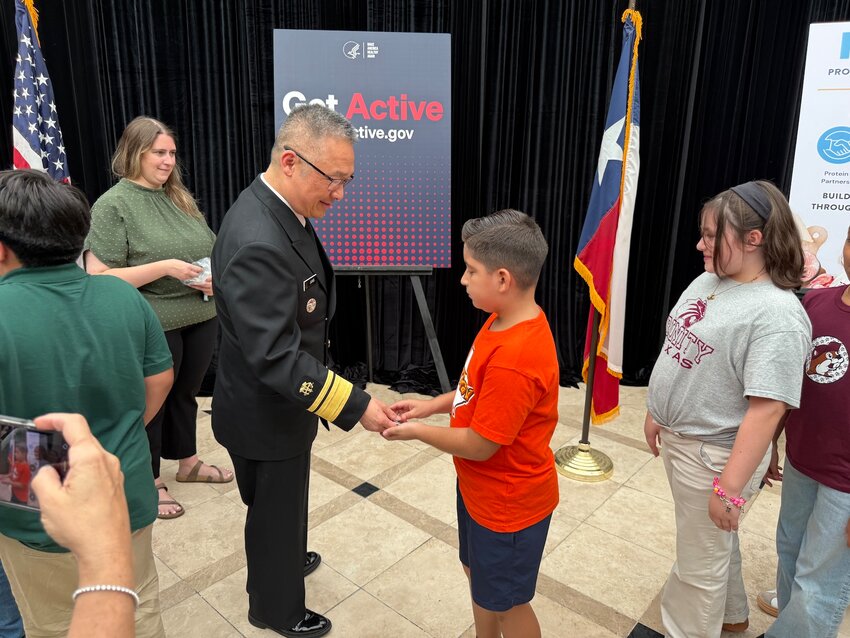 Rear Admiral Paul Jung, M.D., U.S. Deputy Surgeon General, meets Brownsville ISD students. (Photo: RGG/Steve Taylor)