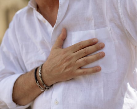 Cristian Jensen holds his hand against his chest