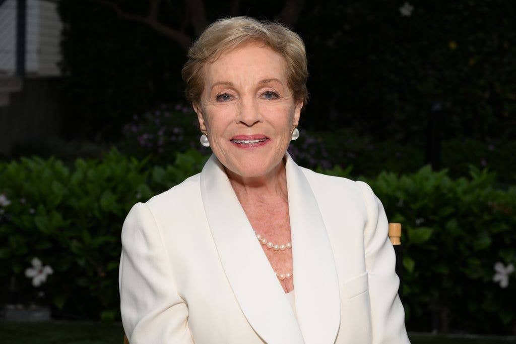 photo of julie andrews in white suit