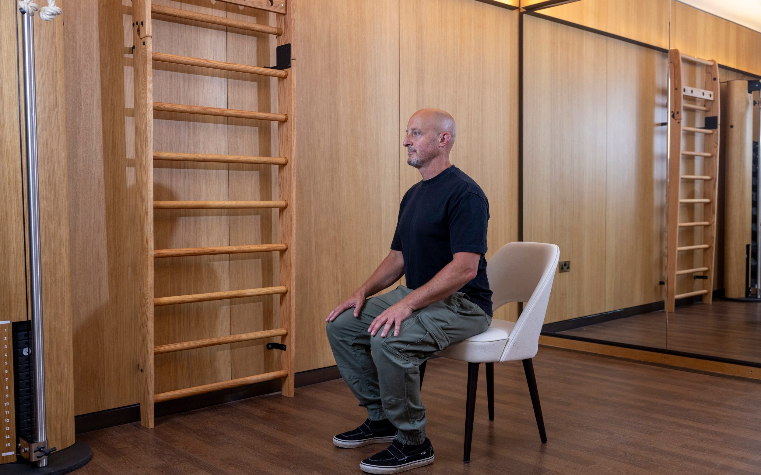 Gideon Remfrey shows the correct form for a sit-to-stand test