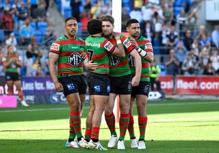 Jai Arrow is hugged as he makes his way off the pitch.