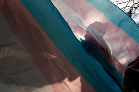 a person behind a flag