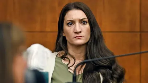 Reuters  Lindsay Clancy on the stand