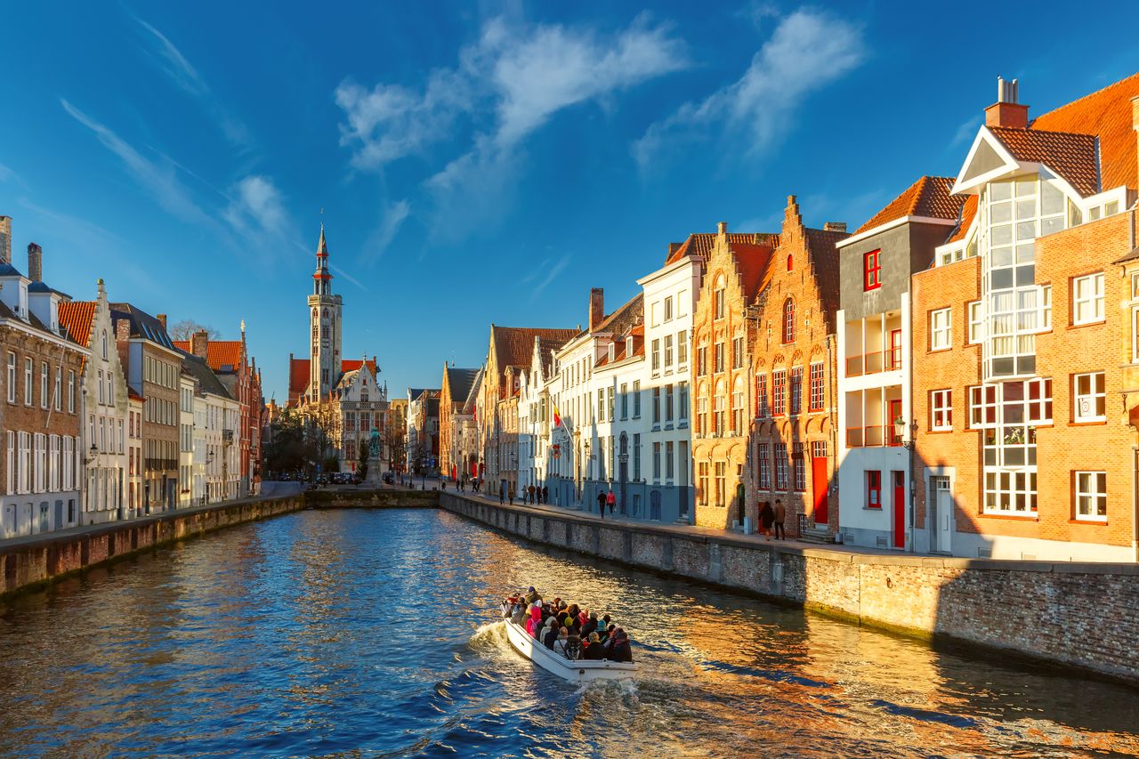 Canals run up to Jan Van Eyck Square in Bruges, Belgium.Credit: KavalenkavaVolha / Getty Images